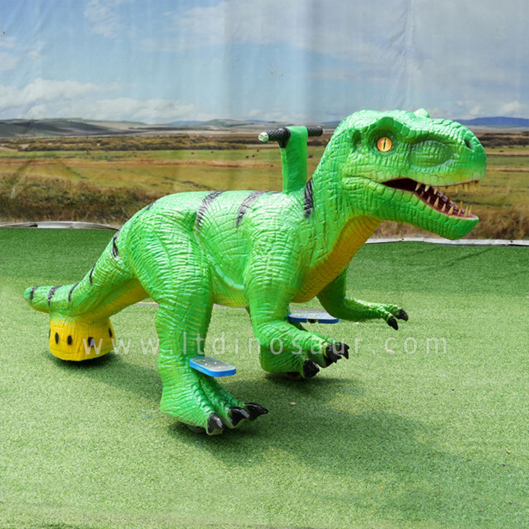 Triciclo con forma de dinosaurio verde 